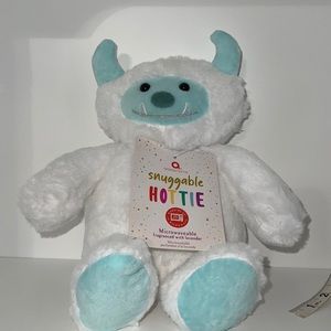 NWT snuggle monster hottie microwaveable
packet infused with lavender 9” sitting